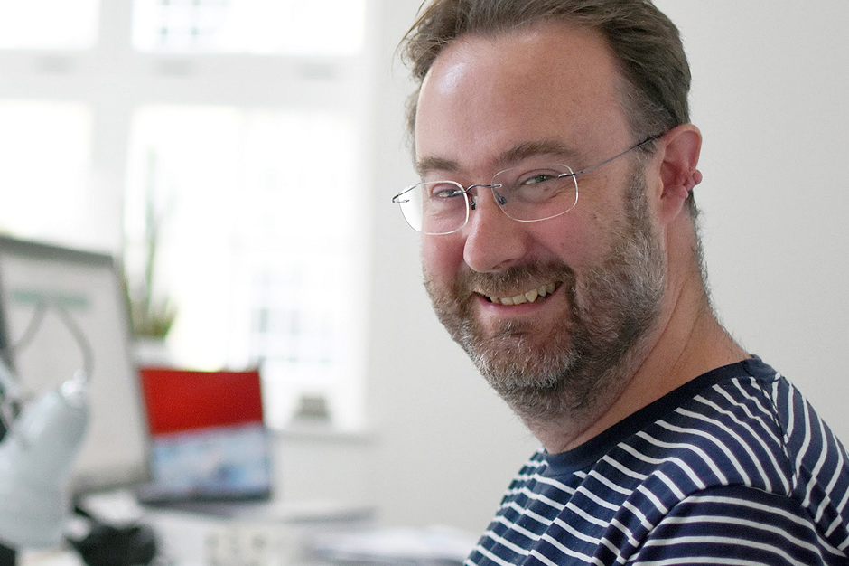 David Graham, profile picture sitting at desk